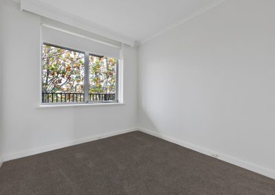 Photo of a room in a house in St Kilda, VIC with new carpet installed by Investa Projects.