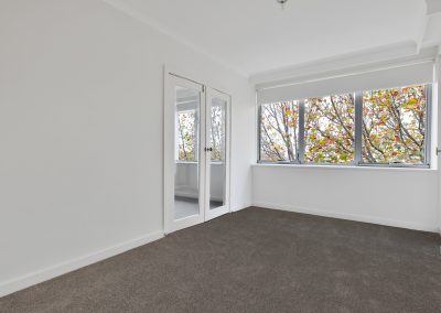 Photo of a room in a house in St Kilda, VIC with new carpet installed by Investa Projects.