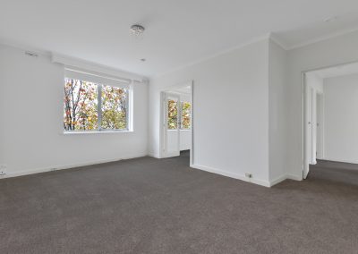Photo of a room in a house in St Kilda, VIC with new carpet installed by Investa Projects.
